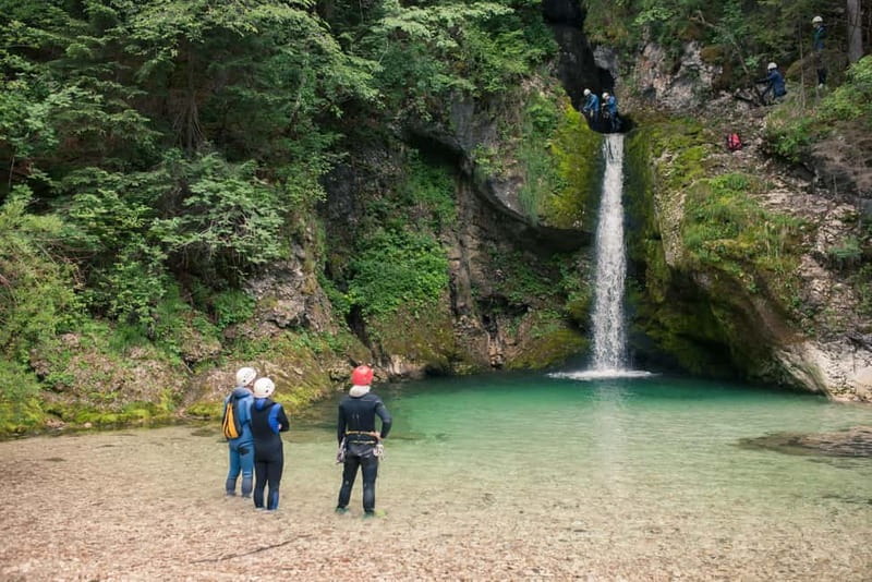 Bled: Triglav National Park Canyoning Adventure with Photos - Getting fitted with a wetsuit, helmet, and harness
