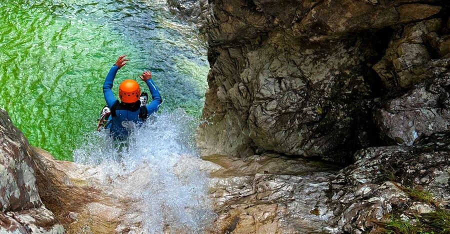 Bovec: 4-Hour Canyoning Adventure - Entering the water with a small group