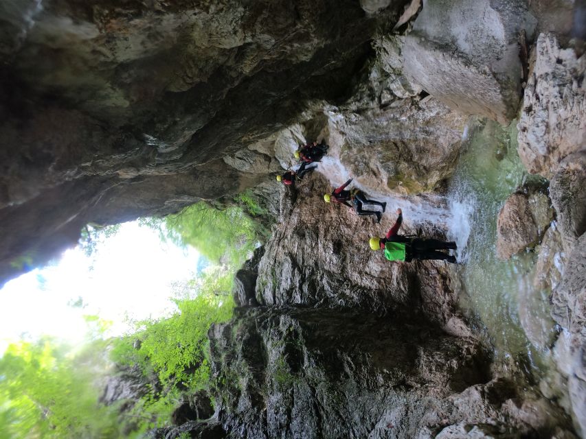 Bovec: Canyoning in Triglav National Park Tour + Photos - Jumping into the emerald pools