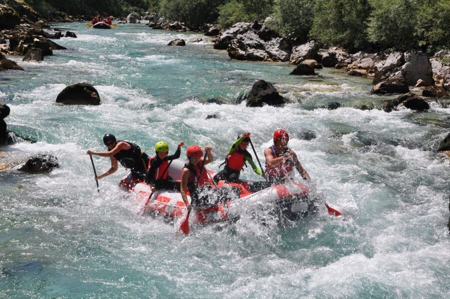 Bovec: Soca River Adventure Rafting With Photos Included - Getting suited up for the Soča
