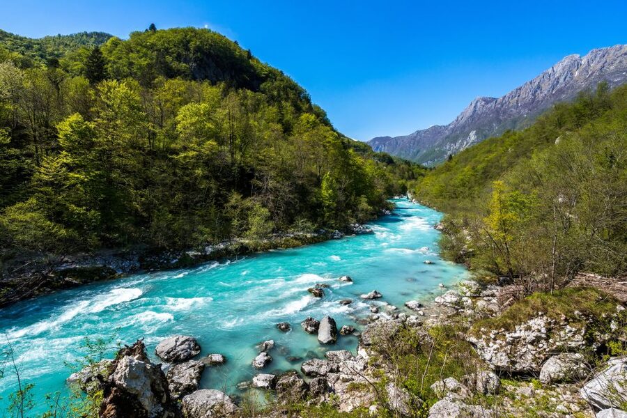 From Ljubljana: Guided Day Tour to Soča and Kranjska Gora - Kozjak Waterfall rewards the short walk