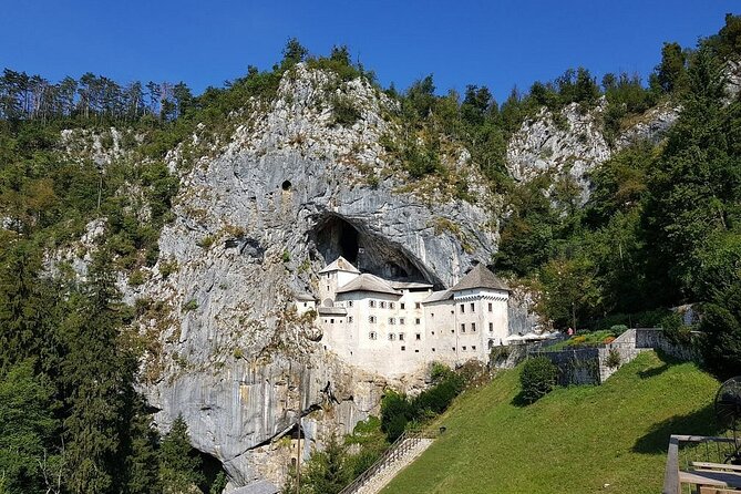 Ljubljana: Postojna cave & Predjama castle small group tour - Entering the vast Postojna Cave