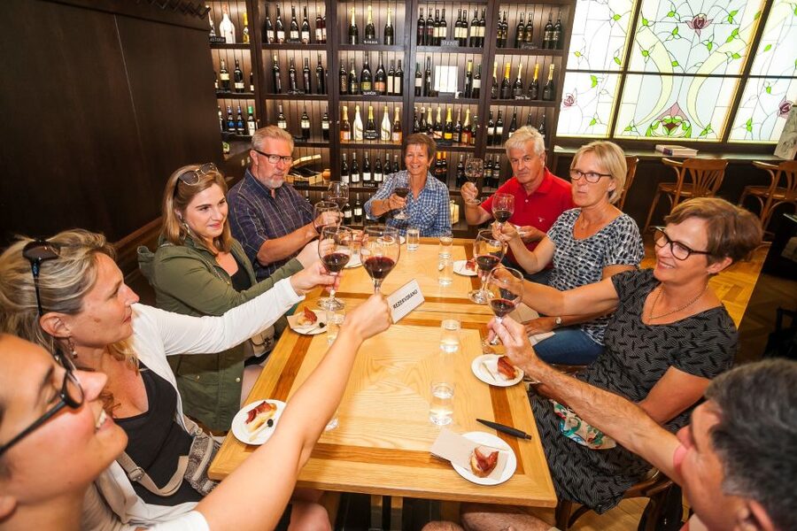 Ljubljana: Slovenian Cuisine Walking Tour with Tastings - Five Slovenian food stops and wine pairings