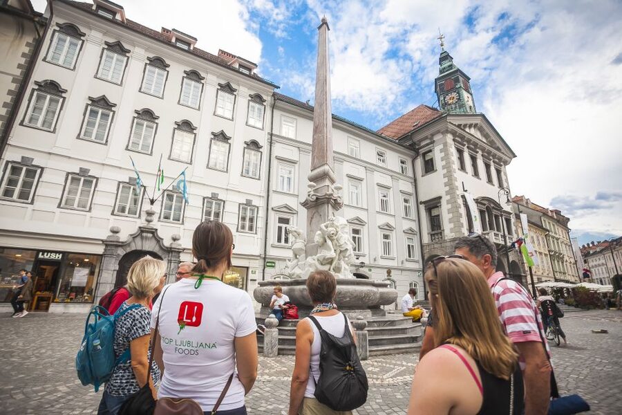 Ljubljana: Slovenian Cuisine Walking Tour with Tastings - Starting beside the Triple Bridge