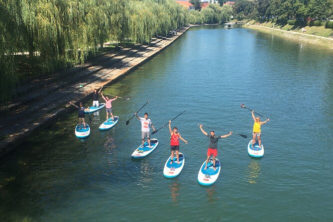 Ljubljana Stand-Up Paddle Boarding Lesson and Tour - Paddling from Špica toward central Ljubljana