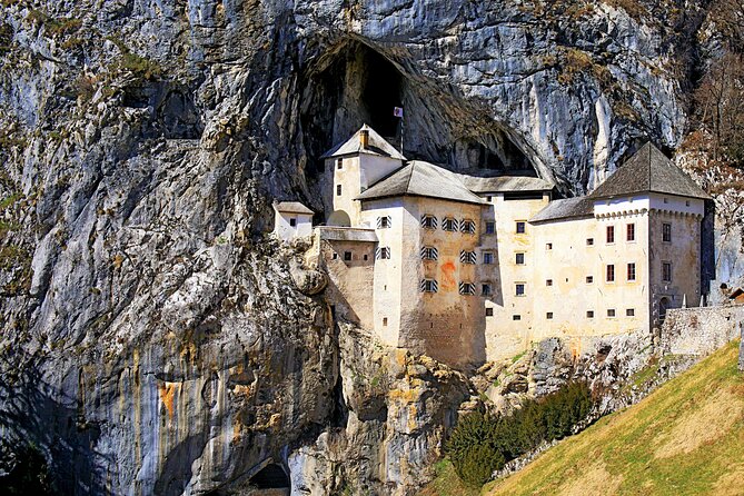 Postojna Cave and Predjama Castle Tour from Ljubljana - Predjama Castle, built into a 123-meter cliff