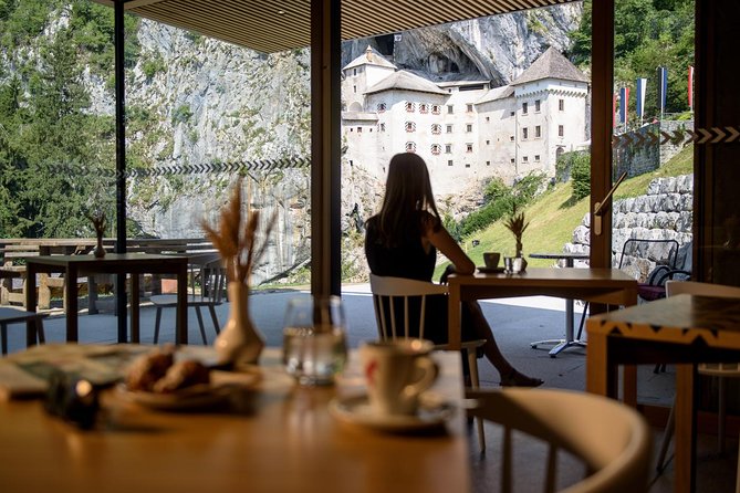 Postojna Cave & Photostop Predjama castle - Group Tour from Koper - Predjama Castle is a striking 15-minute pause